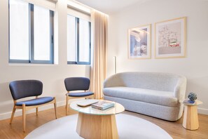 Deluxe Apartment, 2 Bedrooms, Courtyard View | Living area | 28-inch Smart TV with cable channels, TV, MP3 dock - Catarina Serviced Apartments (Porto)