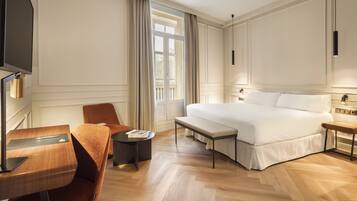 Premium bedding, down comforters, in-room safe, desk
