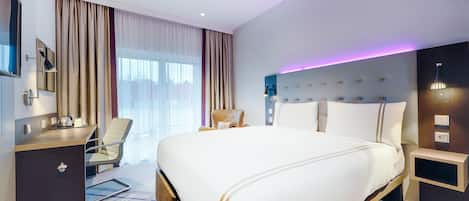 Chambre Standard double | SystĂšme dâinsonorisation, fer et planche Ă repasser