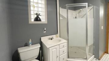 Shower, jetted tub, towels, soap