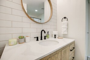 Combined shower/tub, hair dryer