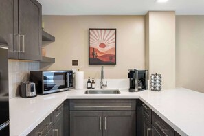Coffee/tea maker, fridge, microwave, toaster