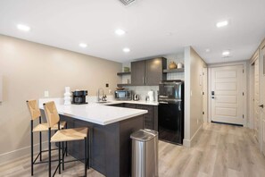 Coffee/tea maker, fridge, microwave, toaster