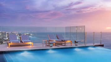 2 outdoor pools, sun loungers, lifeguards on site