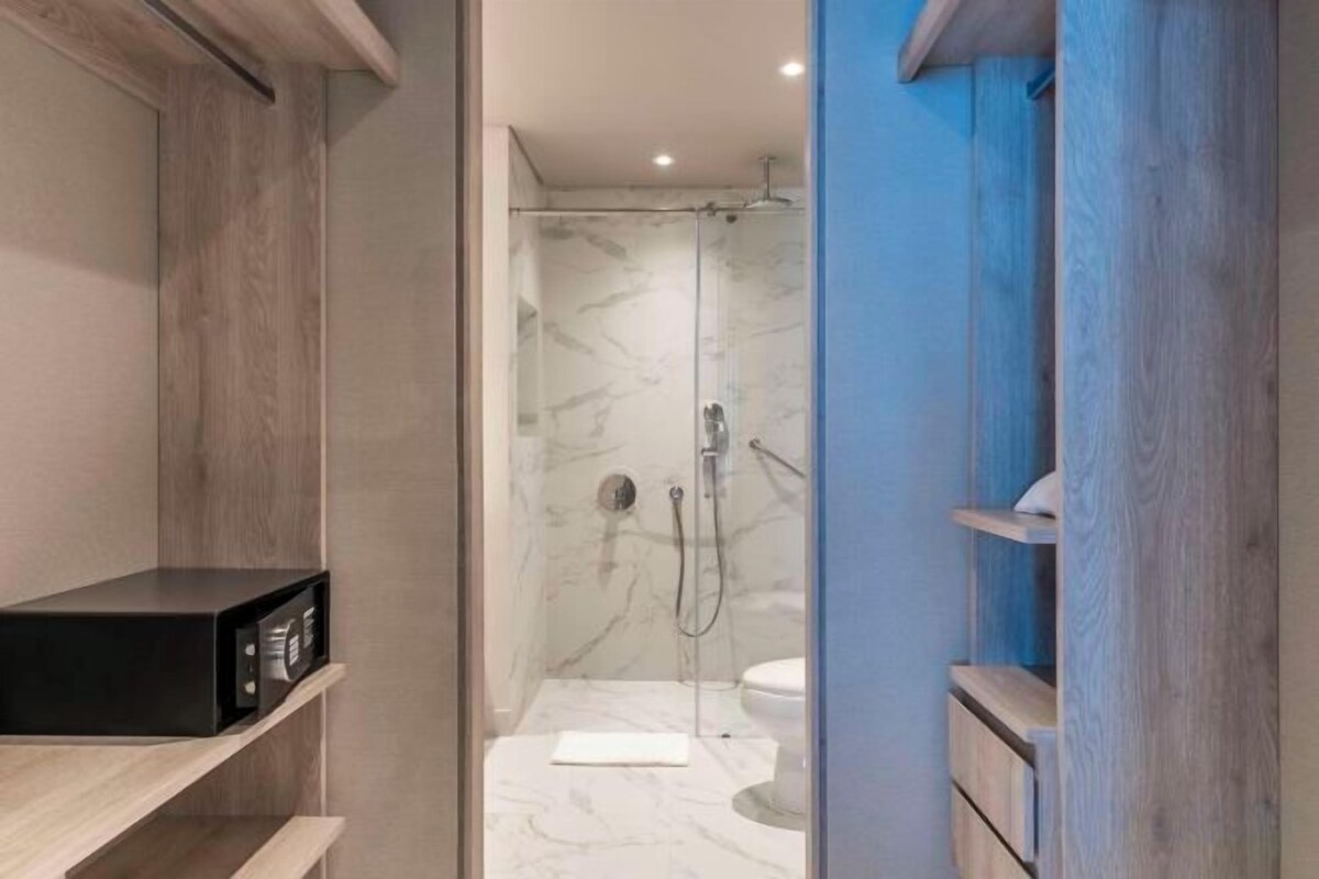 Hair dryer, towels, soap, shampoo