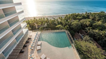 2 outdoor pools, sun loungers, lifeguards on site