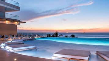 2 outdoor pools, sun loungers, lifeguards on site