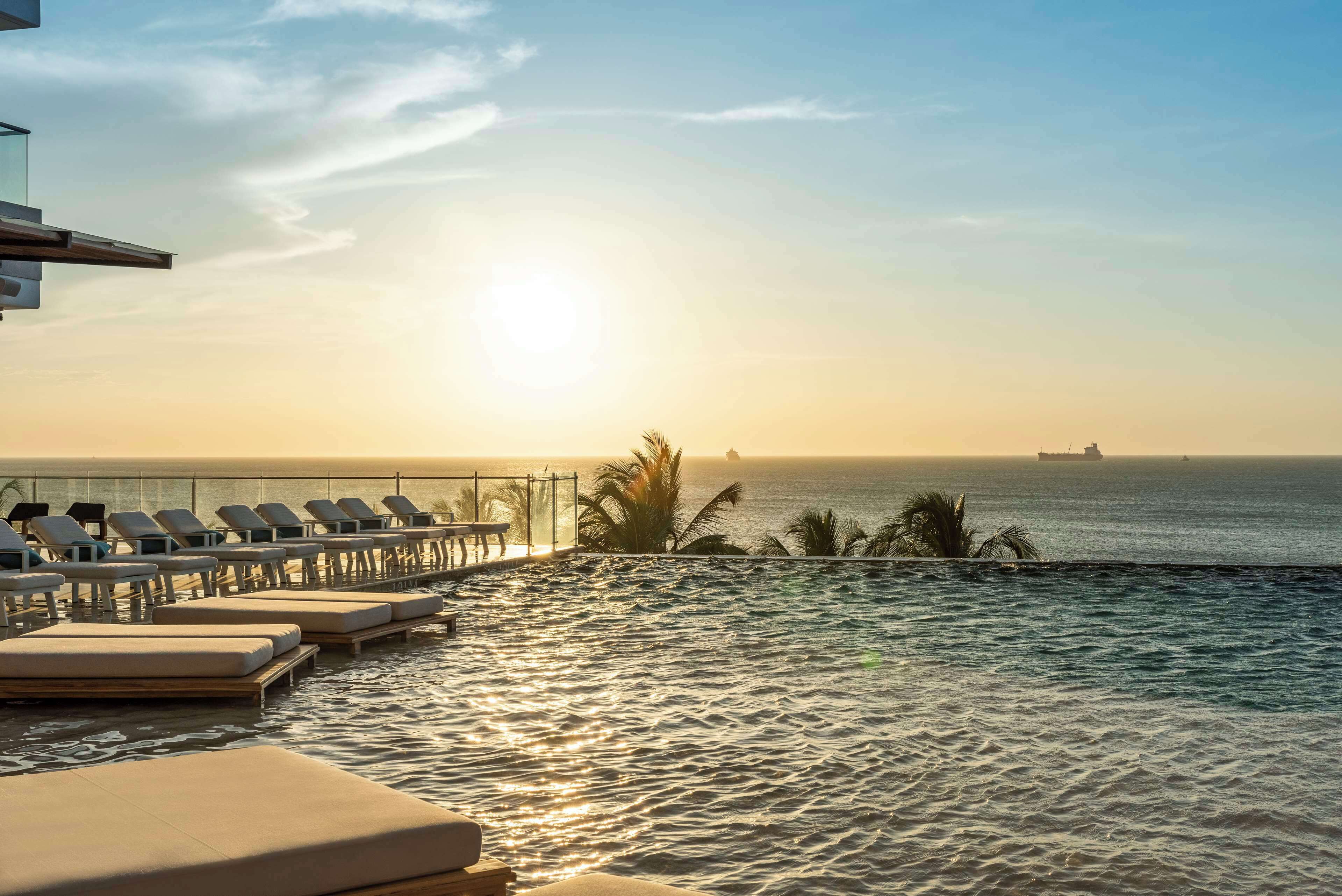 2 outdoor pools, sun loungers, lifeguards on site