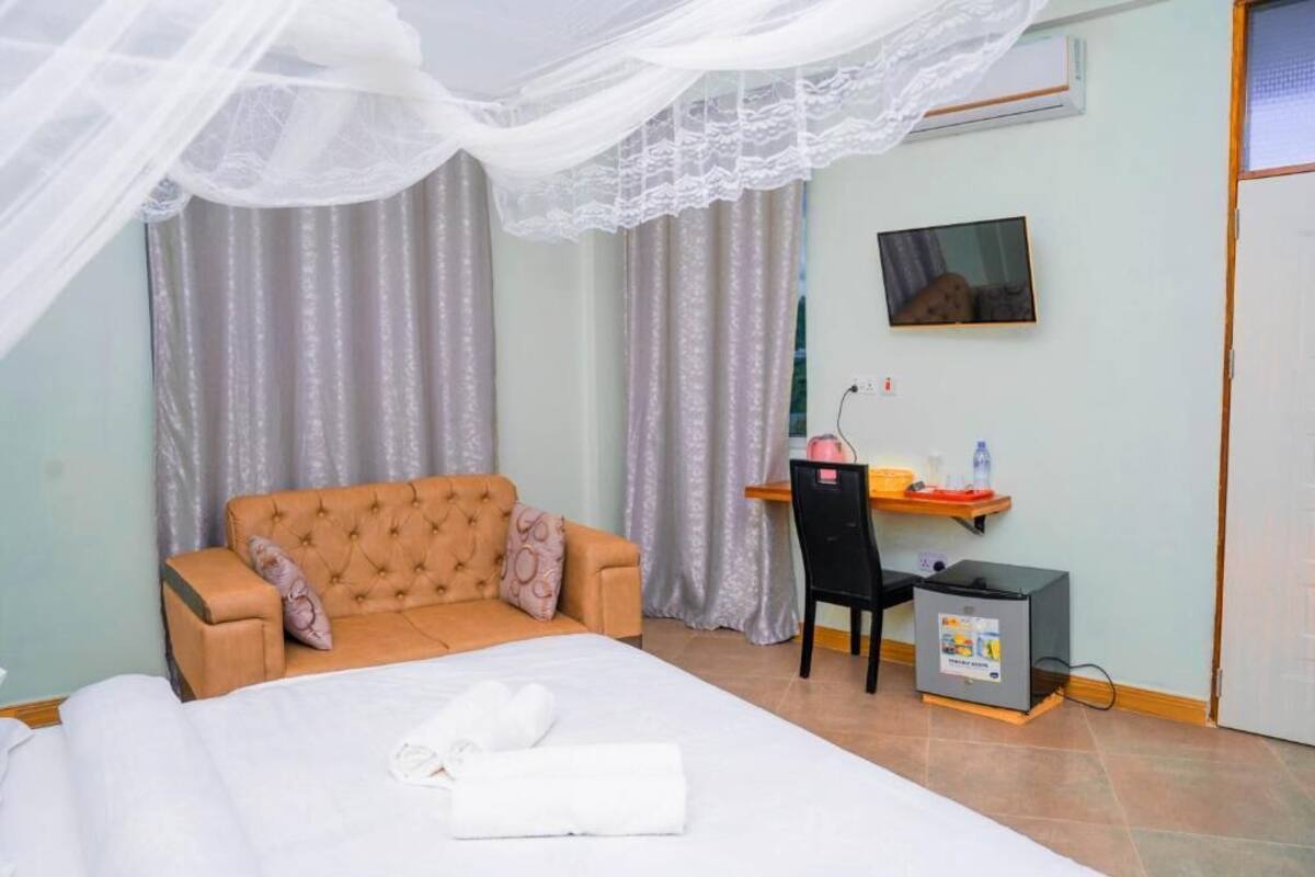 Quarto casal luxo | Ferros/tábuas de passar roupa