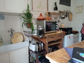 Microwave, oven, stovetop, dining tables