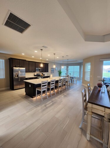 Villages, 3bed- 2.5ba waterfrnt+ golf cart- all bedrooms have king beds!