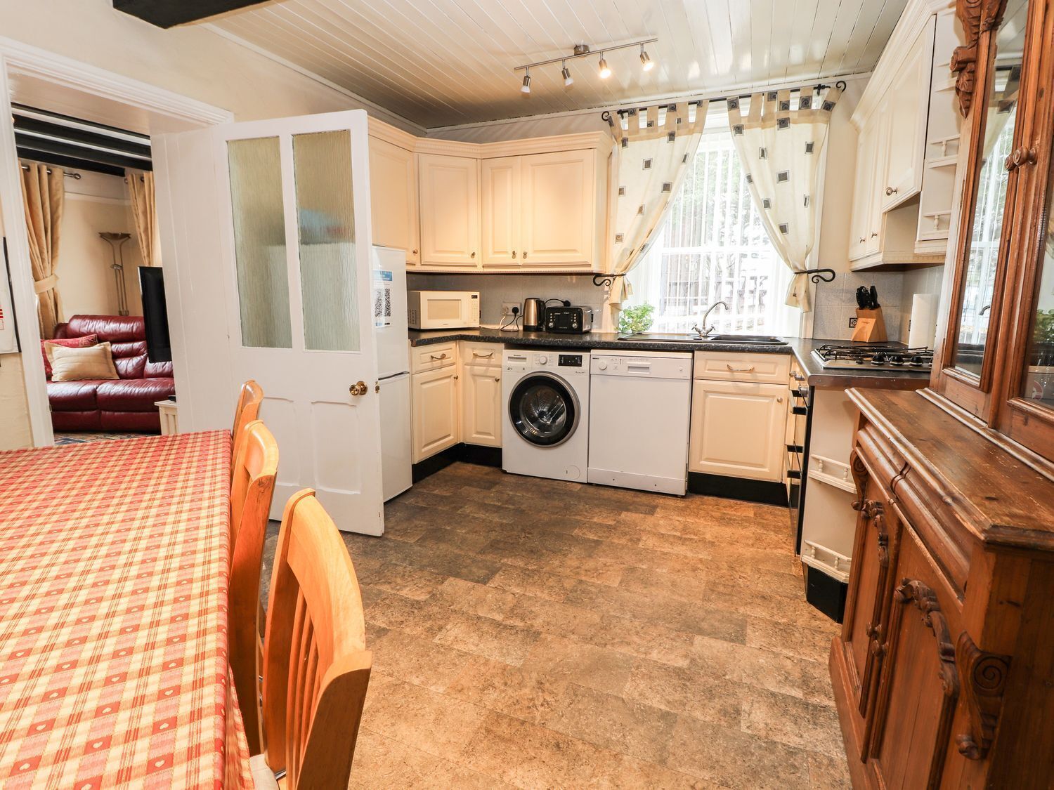 Fridge, electric kettle, toaster, cookware/dishes/utensils