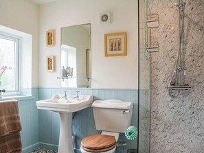 Separate tub and shower, deep soaking tub, hair dryer, towels