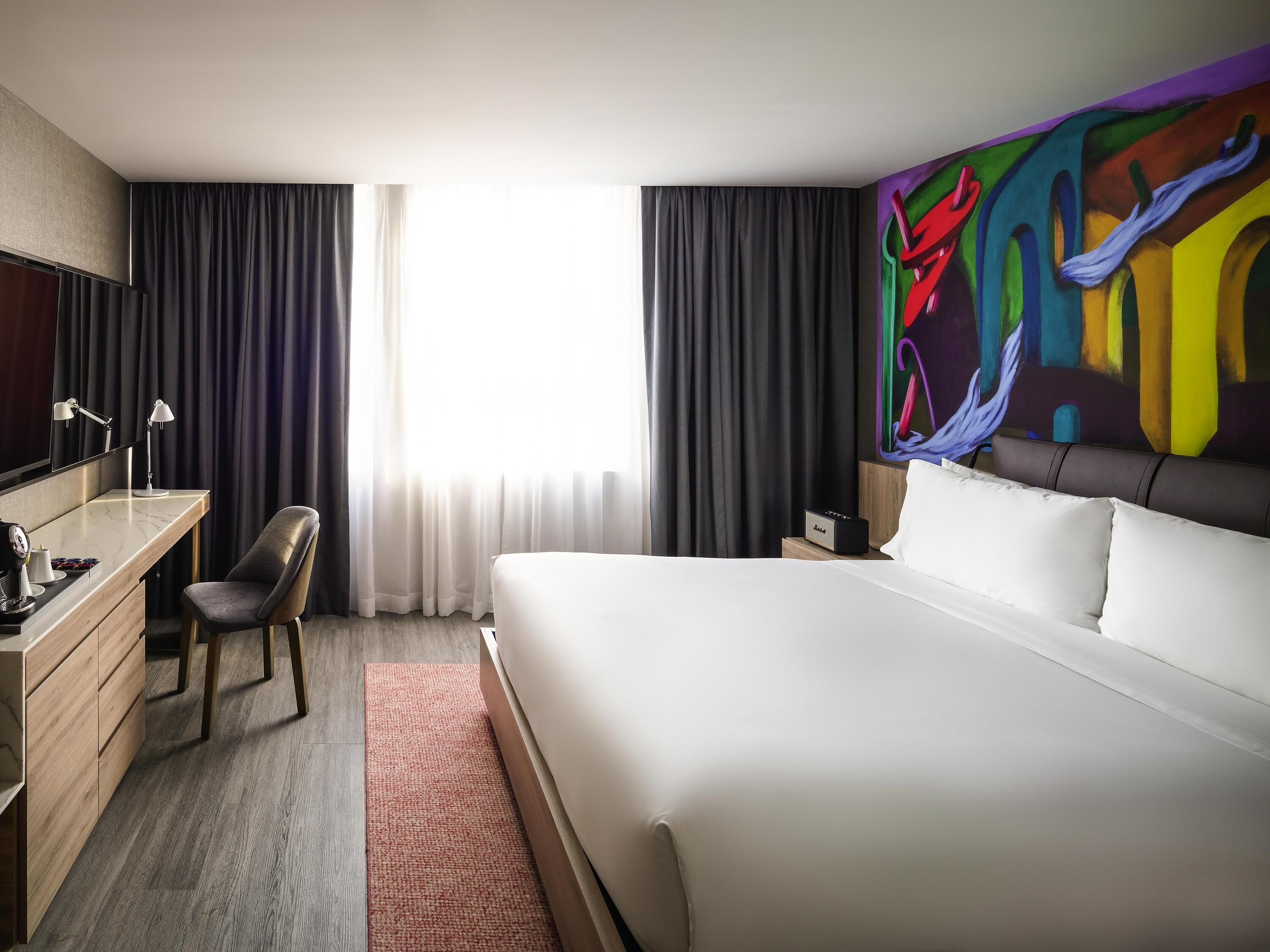Premium bedding, down duvets, minibar, in-room safe