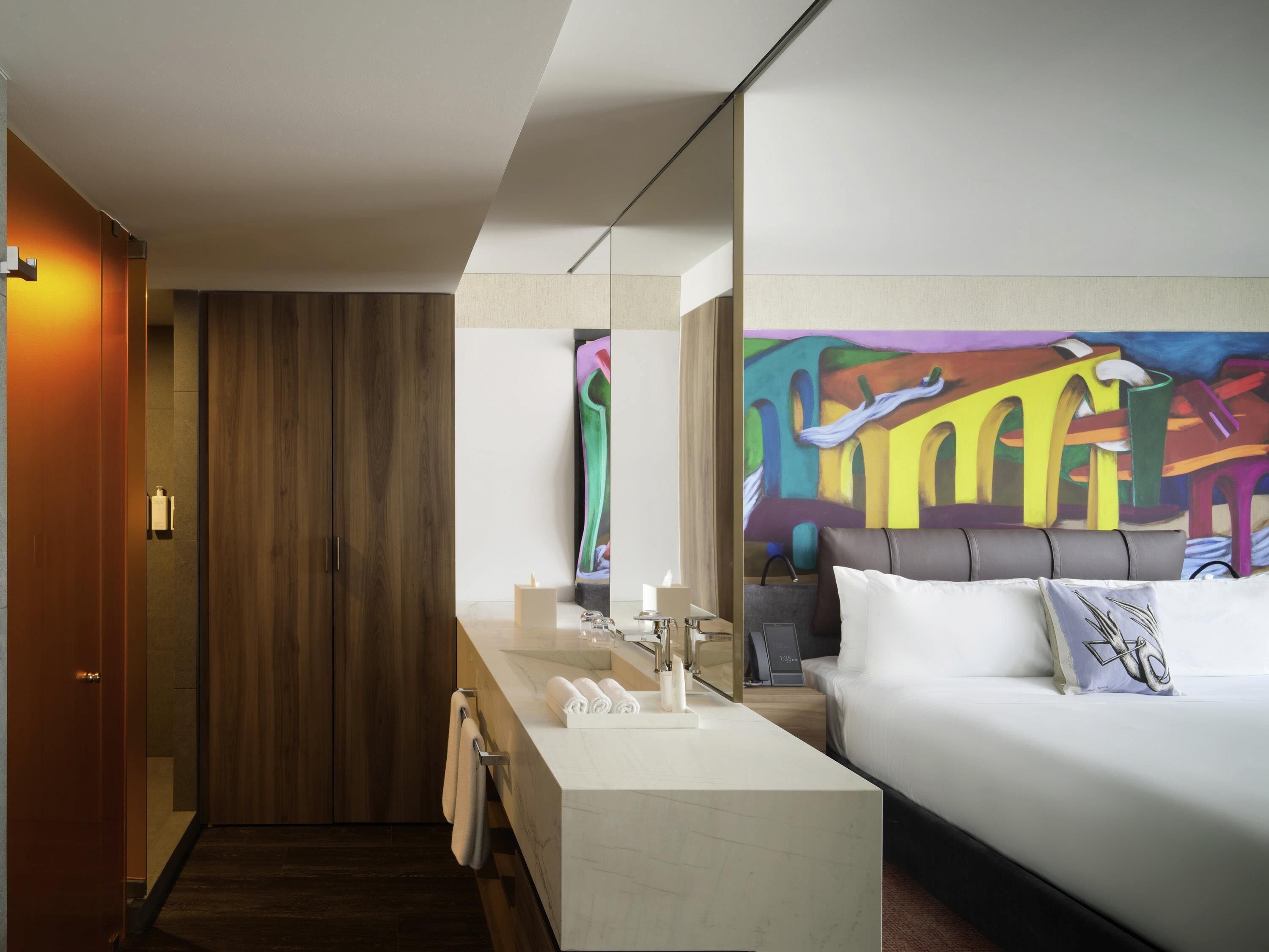 Premium bedding, down duvets, minibar, in-room safe