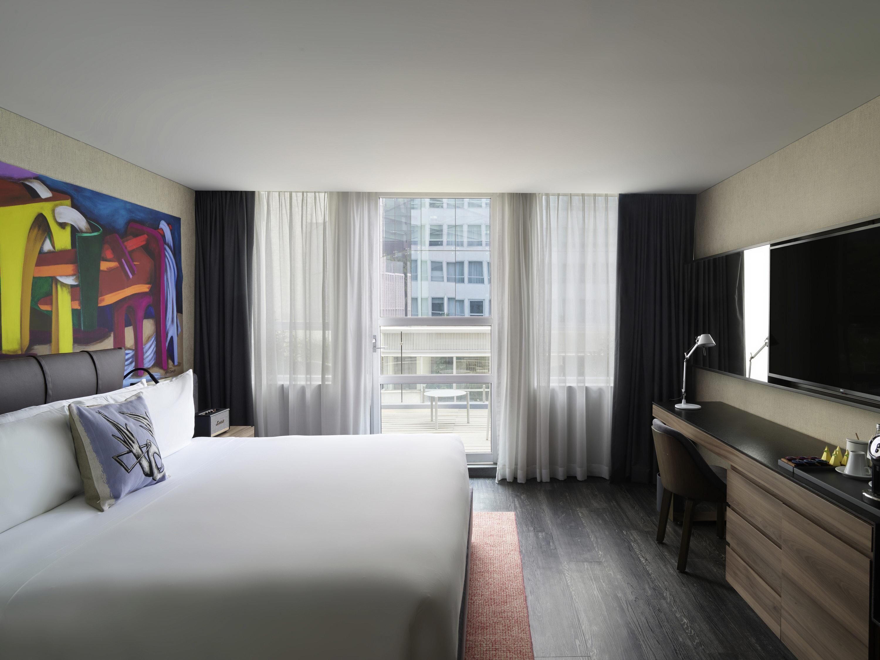 Suite, 1 kingsize bed, terras | Luxe beddengoed, donzen dekbedden, een minibar, een kluis op de kamer