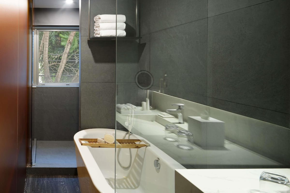 Suite, 1 King Bed, Corner (Corner) | Premium bedding, down comforters, minibar, in-room safe