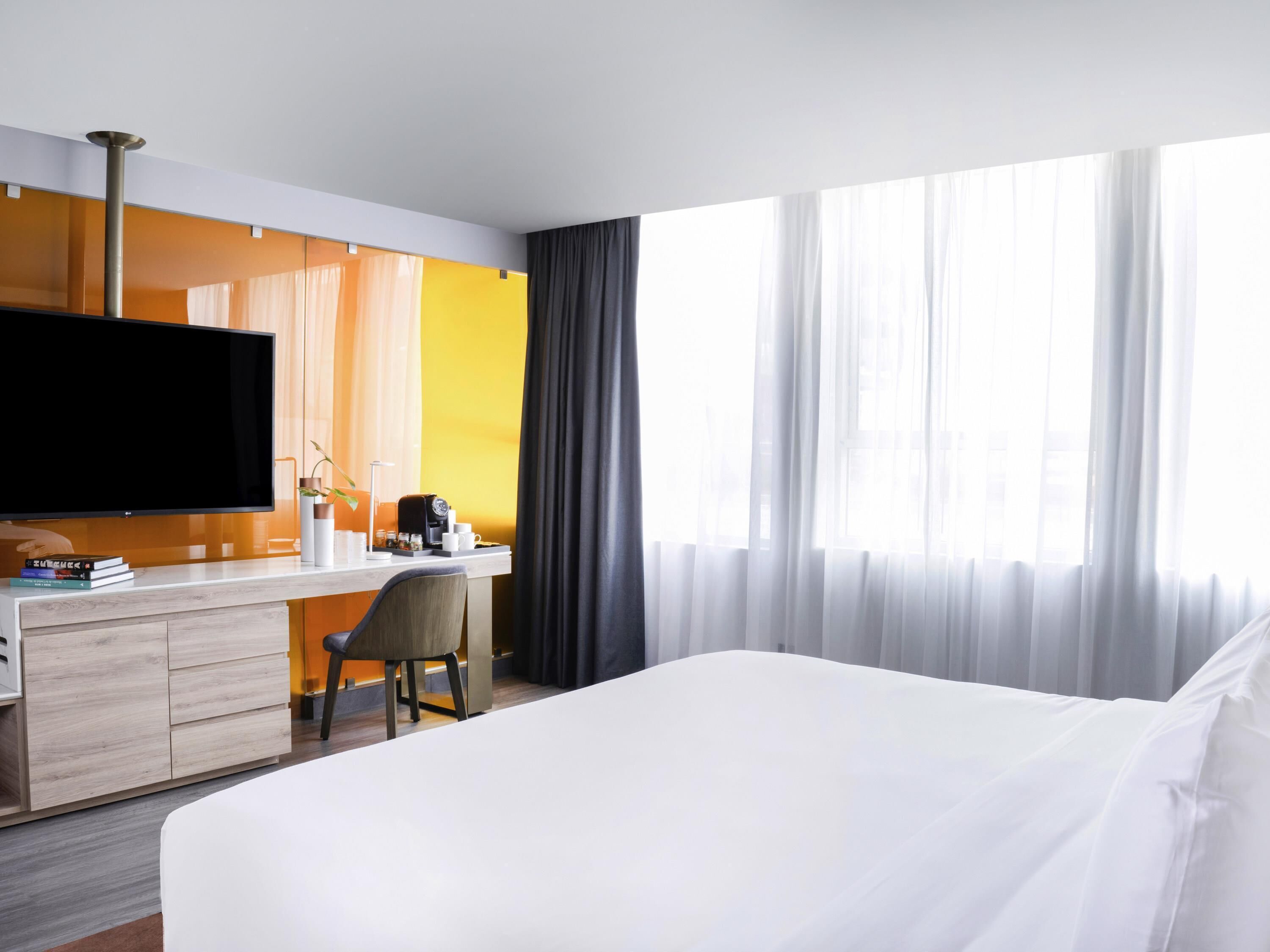Luxe beddengoed, donsdekens, een minibar, een kluis op de kamer