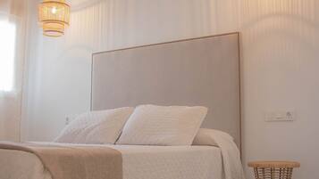 Premium bedding, down comforters, memory foam beds, desk
