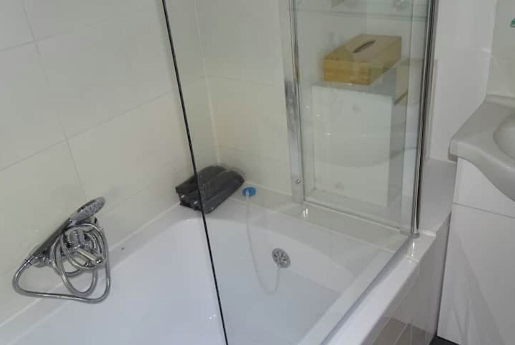 Combined shower/tub, hair dryer, towels, soap