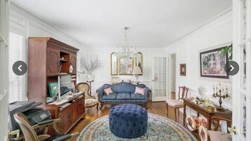 Fireplace, books, computer monitors, printers