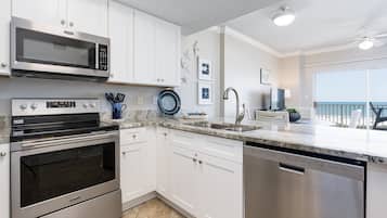 Coffee/tea maker, fridge, microwave, oven