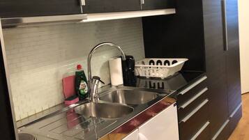 Apartment, 2 Twin Beds | Private kitchen | Fridge, microwave, stovetop, electric kettle