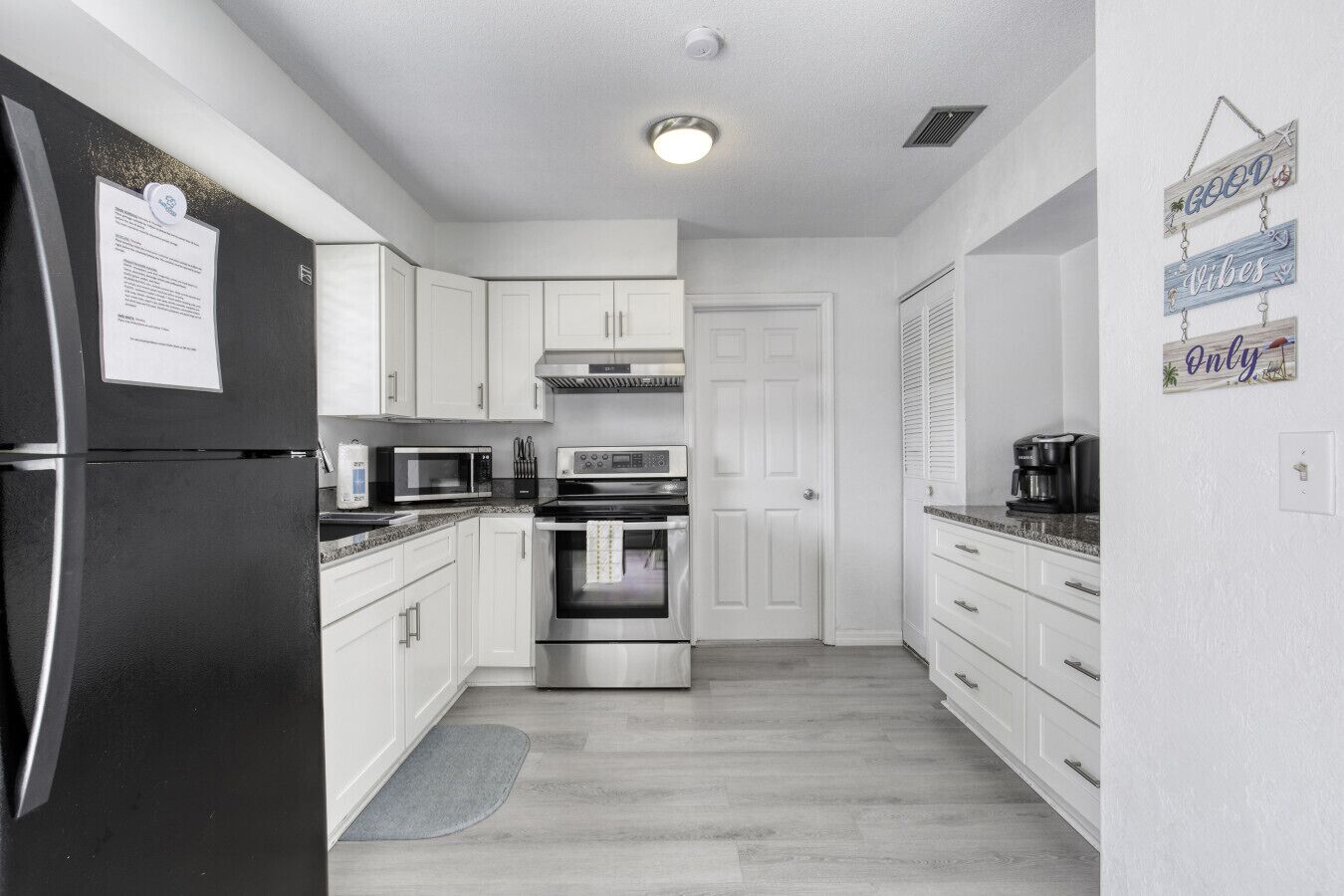 Coffee/tea maker, fridge, microwave, oven