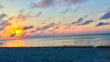 On the beach, sun loungers