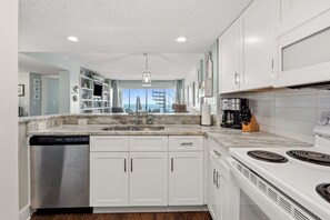 Fridge, microwave, oven, stovetop - Luxury, condo w/oceanfront panoramic views, indoor pool, Jacuzzi, and private rooftop terrace (North Myrtle Beach)