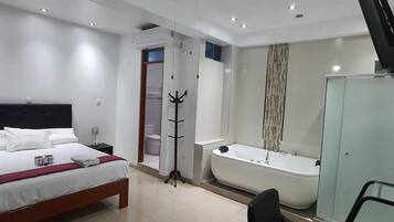 Exclusive Studio Suite | Premium bedding, down comforters, Select Comfort beds, desk