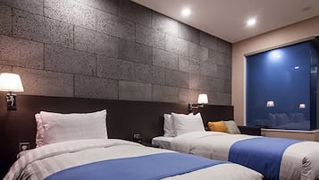 Standard Twin Room | Down comforters, in-room safe, blackout drapes, iron/ironing board