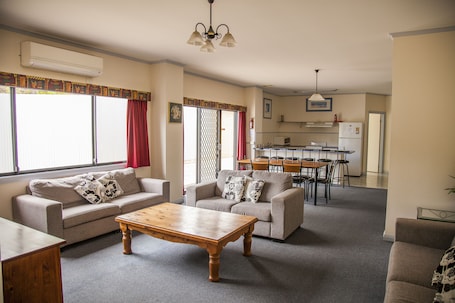 Family Apartment, 3 Bedrooms | Living area | TV, DVD player