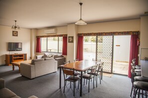 Family Apartment, 3 Bedrooms | Living area | TV, DVD player - Cherry Lane Apartments (Bright)