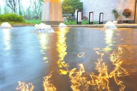 Jardines del alojamiento. Xiyue Hotel