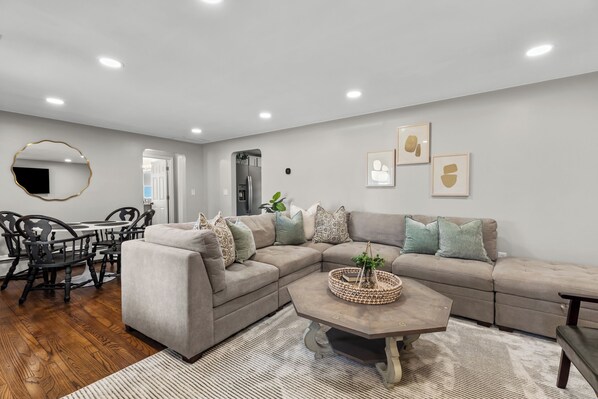 Smart TV, fireplace, books, offices