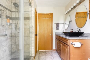 Combined shower/tub, hair dryer, towels, soap