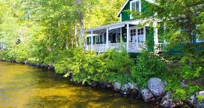 Charming dog-friendly cottage with water view & access, private dock & row boat