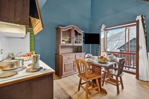Family Apartment, Multiple Bedrooms, Mountainside (Sises Lodge - 19C Sestriere) | Dining - Sises Lodge - 19C Sestriere (Sauze di Cesana)