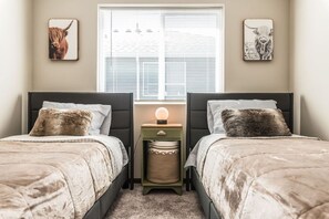 4 bedrooms, desk, iron/ironing board, travel cot