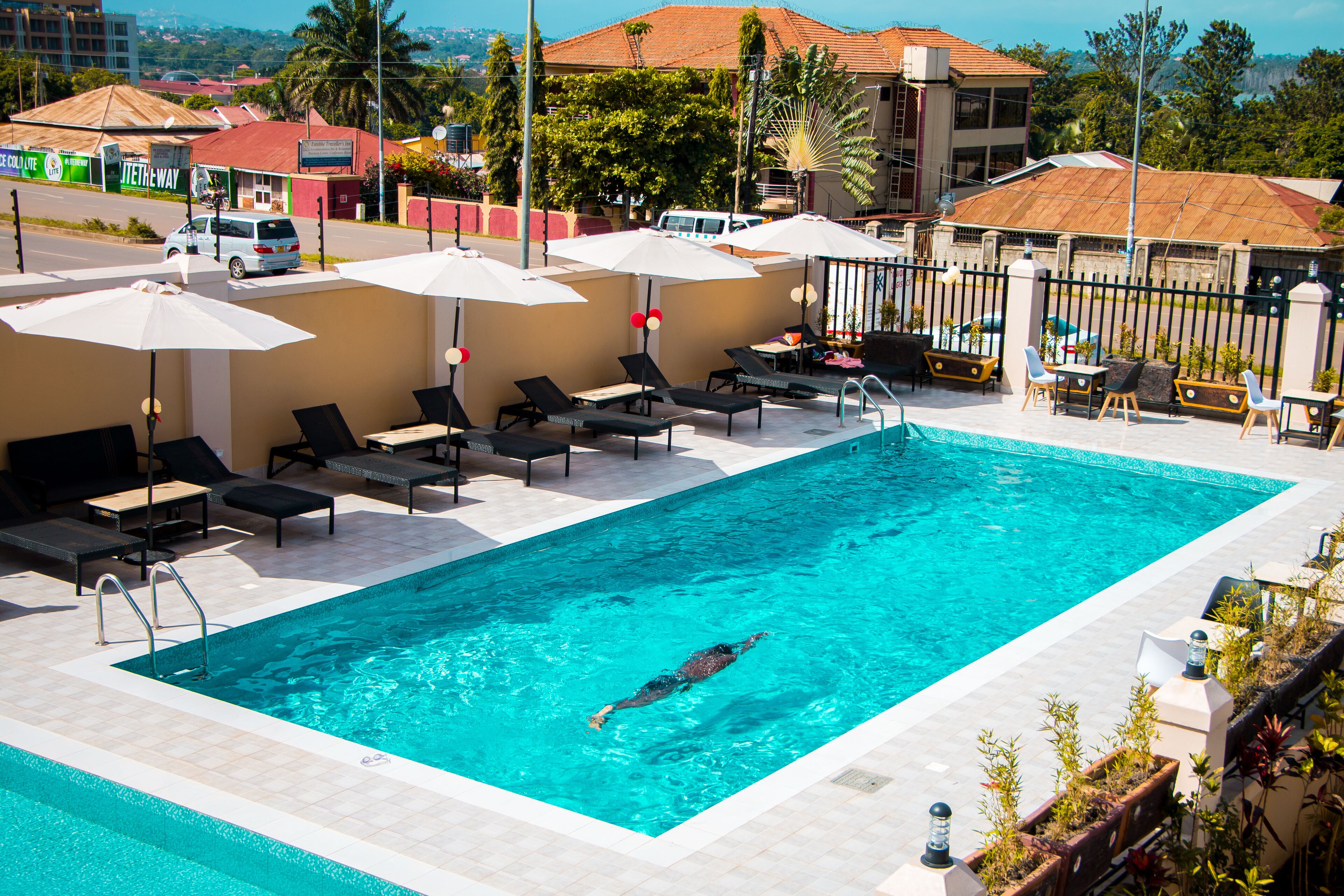 Outdoor pool, pool umbrellas, pool loungers