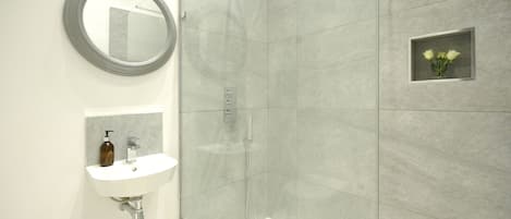 Deluxe House | Bathroom | Hair dryer, soap