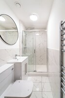 Shower, towels, soap, shampoo