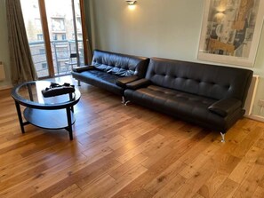 Apartment, Mehrere Betten | Wohnzimmer