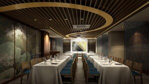 A conference room with long tables, chairs, and a large screen at the front. - Busan Connect Ocean Hotel (Busan)