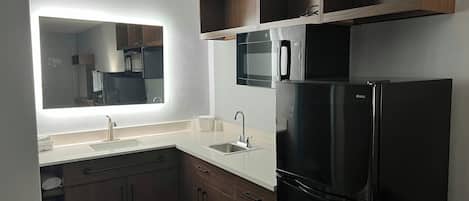 Full-size fridge, microwave, dining tables