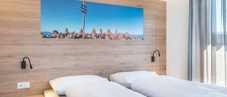 3 室のベッドルーム、WiFi (無料)、ベッドシーツ