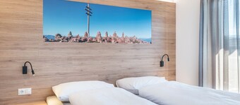Appartamento vacanze "Aster Moments Apt Marie" con vista sulle montagne, balcone e Wi-Fi