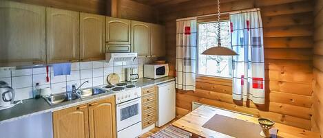 Fridge, microwave, cookware/dishes/utensils