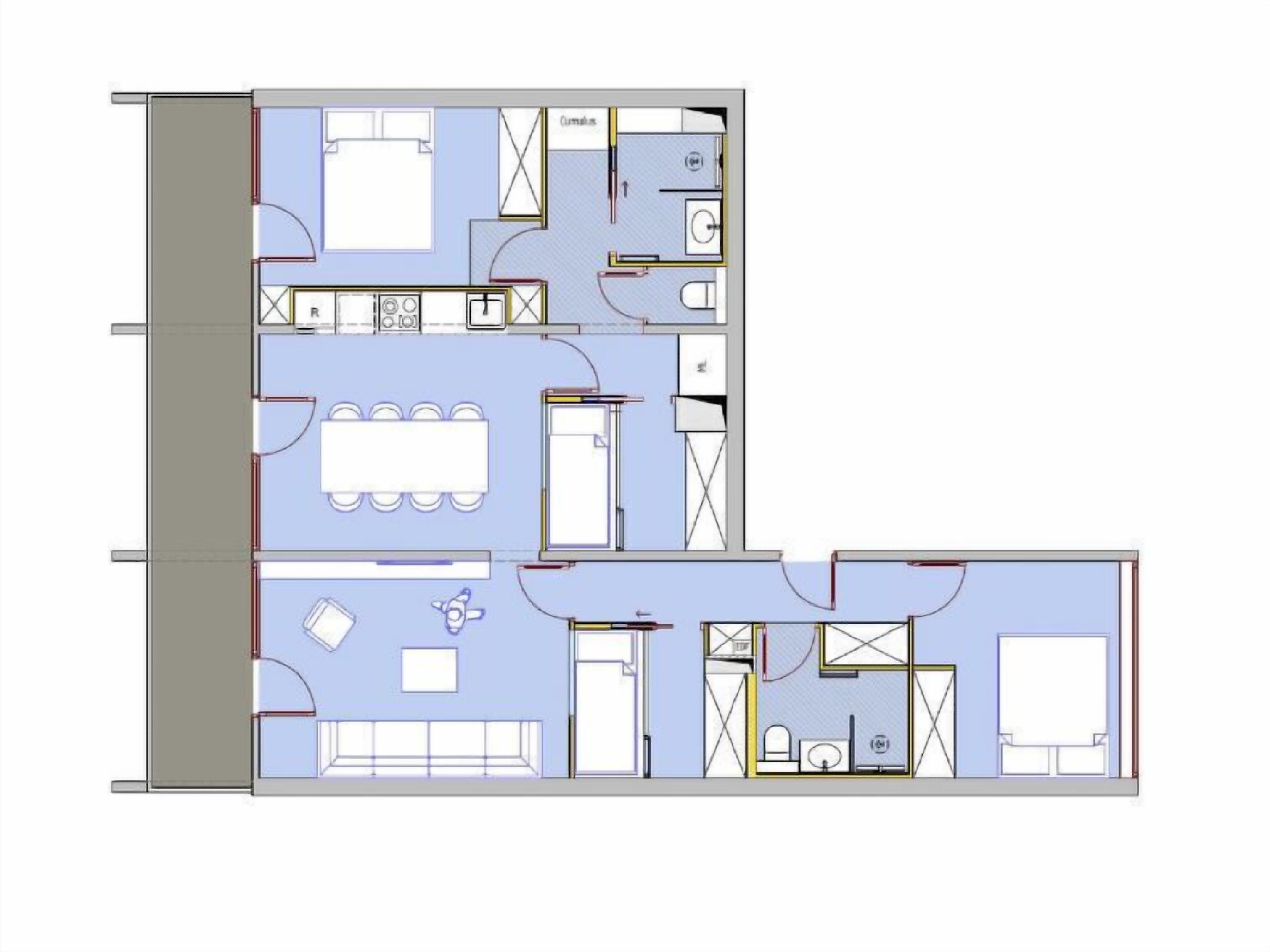 Een plattegrond van een hotel met meerdere kamers, een keuken en een badkamer.